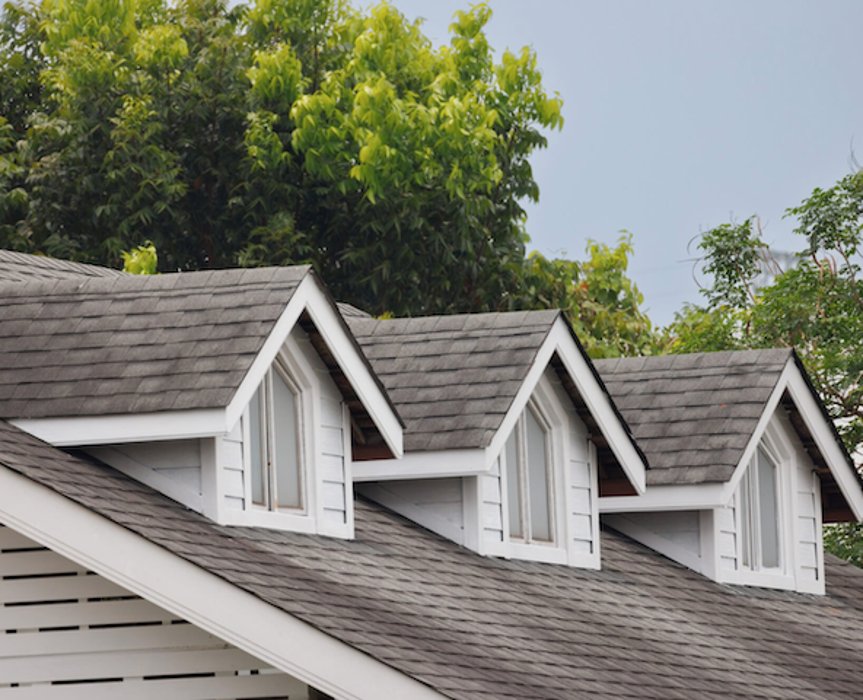 Architectural shingle roof with three dormers, Central Texas