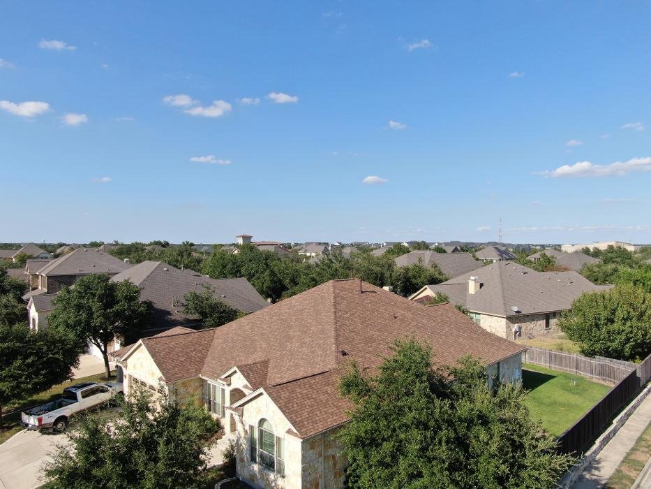 Completed shingle roof replacement, drone view, Austin TX